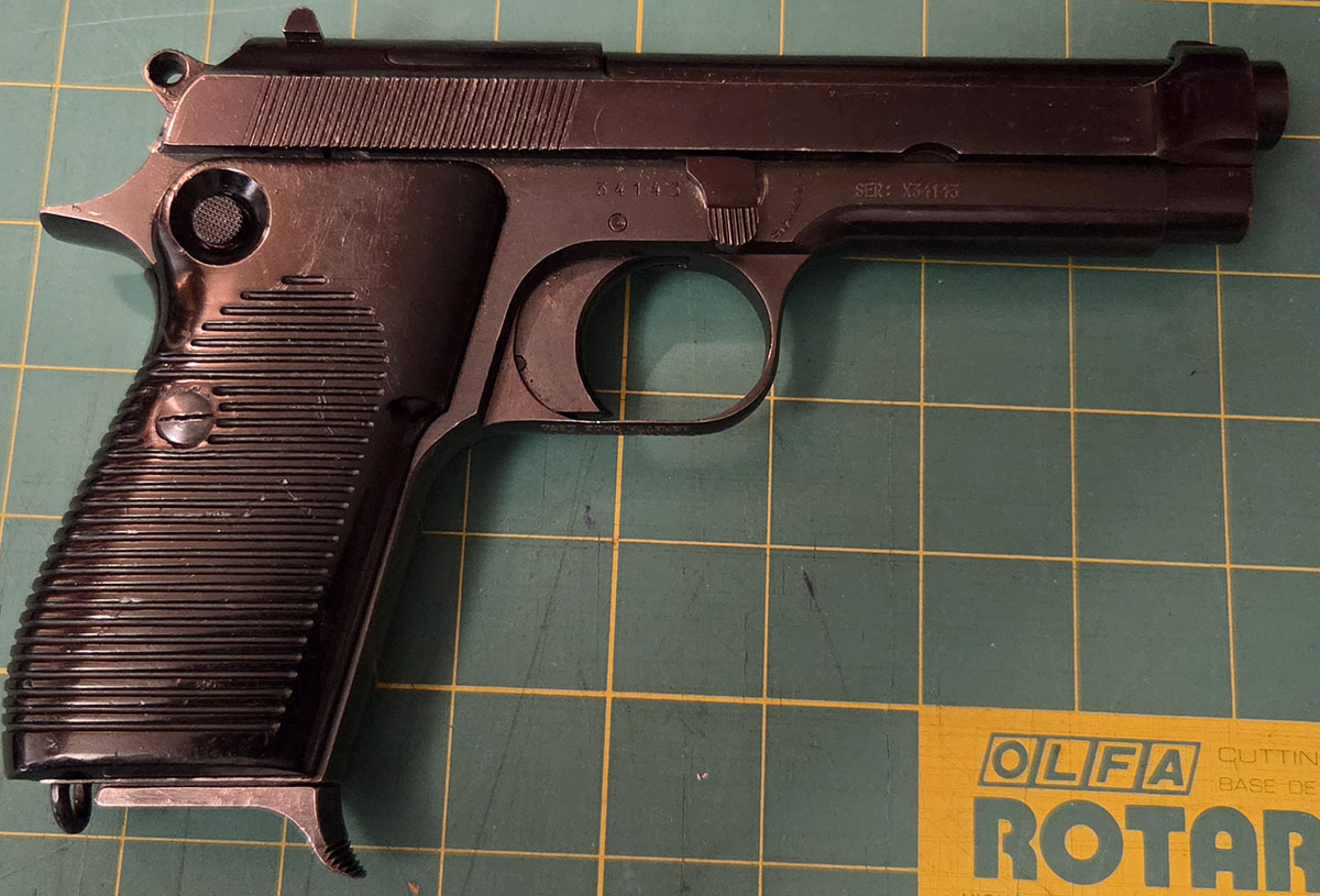 A Beretta 951 pistol, right side