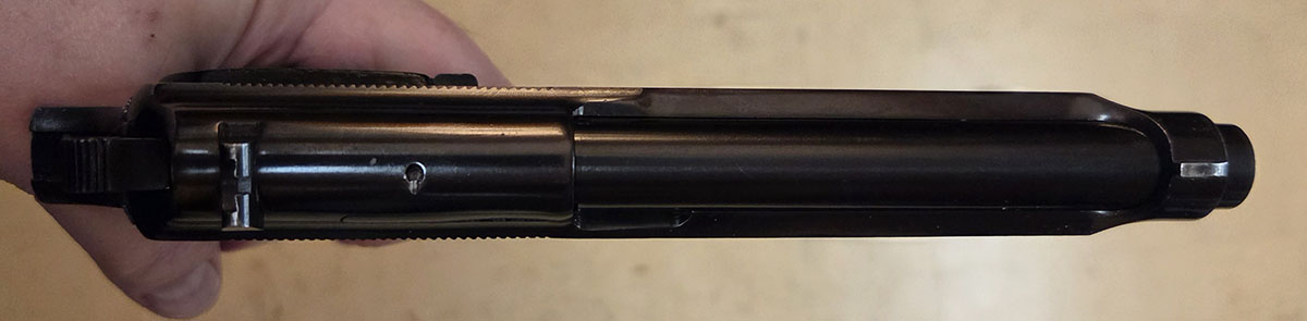 Beretta 951 sights. The rear sight is WELL to the right side of its dovetail.